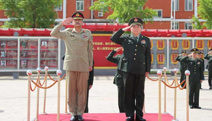 Chief of Army Staff General Asim Munir and PLA commander pictured while saluting. — ISPR