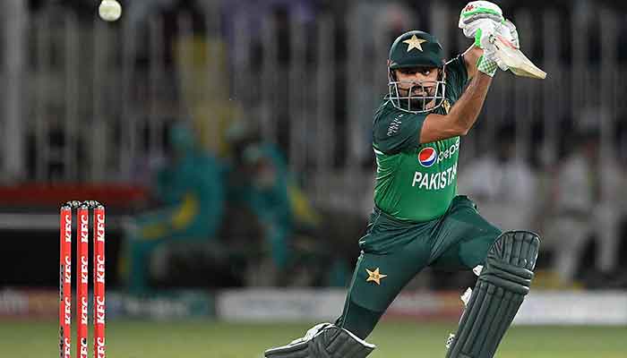 Pakistan´s captain Babar Azam plays a shot during the first one-day international (ODI) cricket match between Pakistan and New Zealand at the Rawalpindi Cricket Stadium in Rawalpindi, on April 27, 2023. — AFP