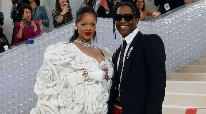 Rihanna exudes bridal vibes at 2023 Met Gala in all-white ensemble with ...
