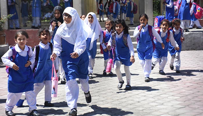 Students leave school for their homes in Islamabad, on May 10, 2023. — Online