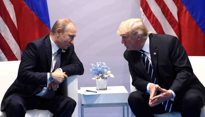 Russian President Putin (Left) and former US President Donald Trump. AFP/File