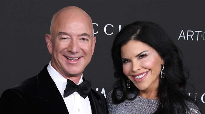 Jeff Bezos, Lauren Sanchez ‘can’t keep hands off each other’