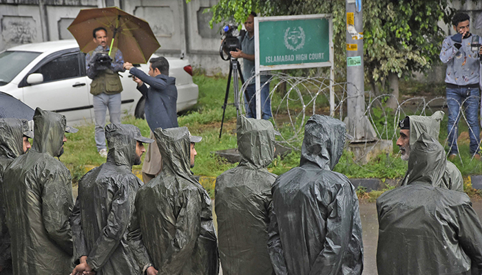 Personnel of Rangers stands guard to maintain security, on the arrival of former prime minister to the Islamabad High Court for a hearing. — Online/File