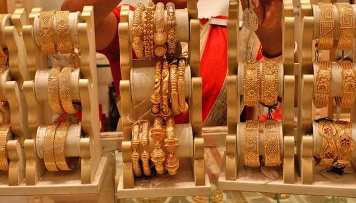 An undated image of gold bangles displayed at a store. — AFP/File