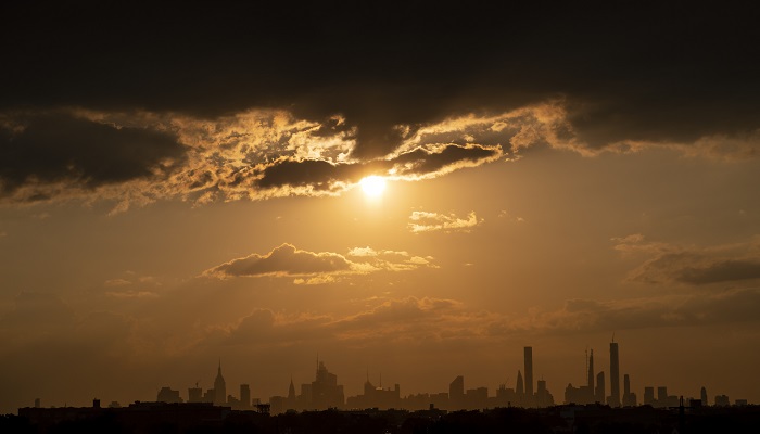 The sun shines on the skyline of midtown Manhattan in September 2019 in New York City. — AFP/File