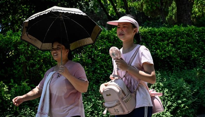 Scientists say the extreme weather has become more frequent due to climate change, and will likely grow more intense as global temperatures continue to rise.— AFP/File