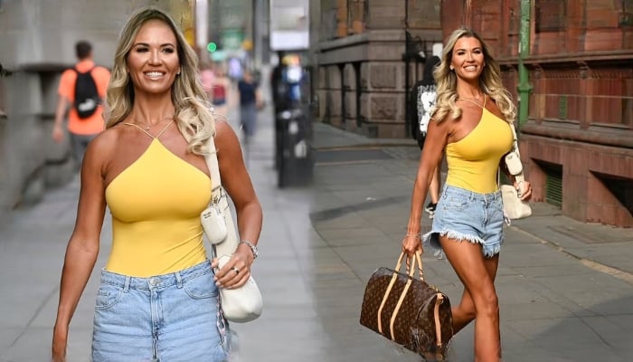 Christine McGuinness beams as she steps out in chic ensemble