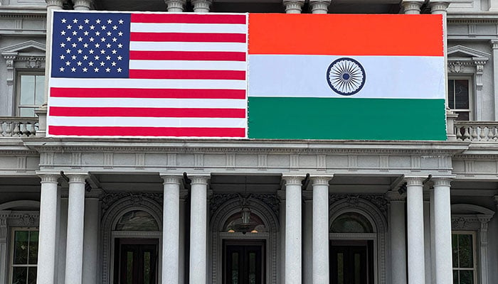 Flags of India and the US adorn the Eisenhower Executive Office Building of the White House in Washington, DC on June 20, 2023. US President Joe Biden will be hosting India´s Prime Minister Narendra Modi for a State visit on June 22, 2023.—AFP