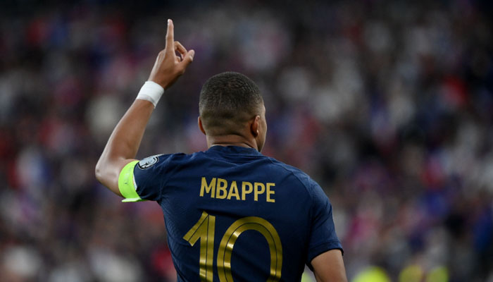 France´s forward Kylian Mbappe celebrates after scoring the team´s first goal during the UEFA Euro 2024 group B qualification football match between France and Greece at the Stade de France in Saint-Denis, in the northern outskirts of Paris, on June 19, 2023.—AFP