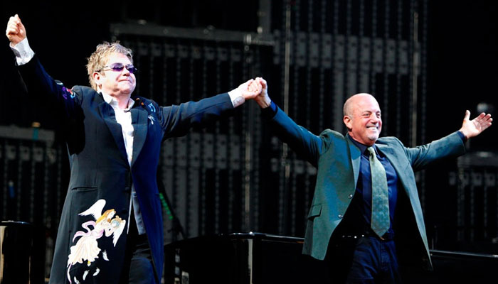 Poster teases Billy Joel appearance at Elton Johns Glastonbury gig