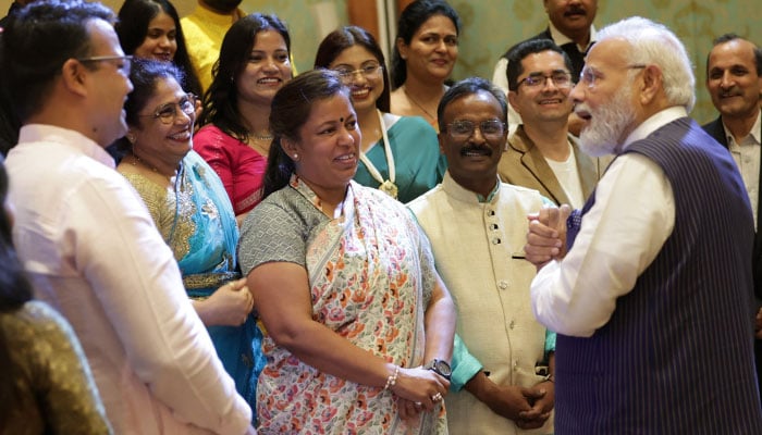 Indian Prime Minister meeting members of the Indian community in Egypt.—Twitter@PMOIndia