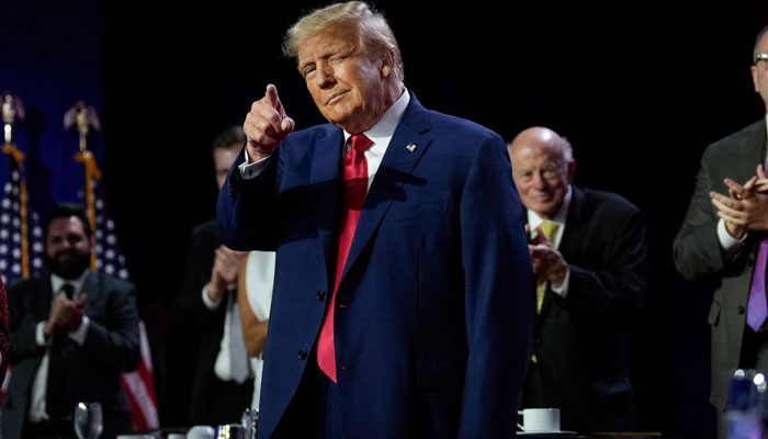 Former US President Donald Trump arrives onstage to speak at the Faith and Freedom Road to Majority conference at the Washington Hilton on June 24, 2023, in Washington, DC. — AFP