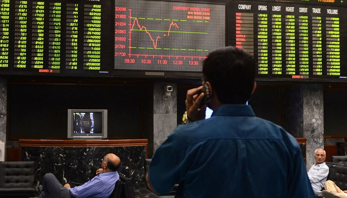 People at the Pakistan Stock Exchange during the days trade in Karachi in this undated photo. — AFP/File