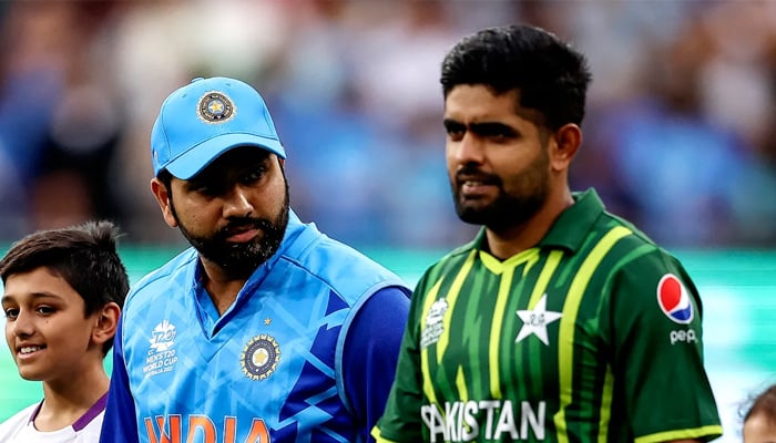 Indias Rohit Sharma looks at Pakistan skipper Babar Azam during a match. — ICC/File