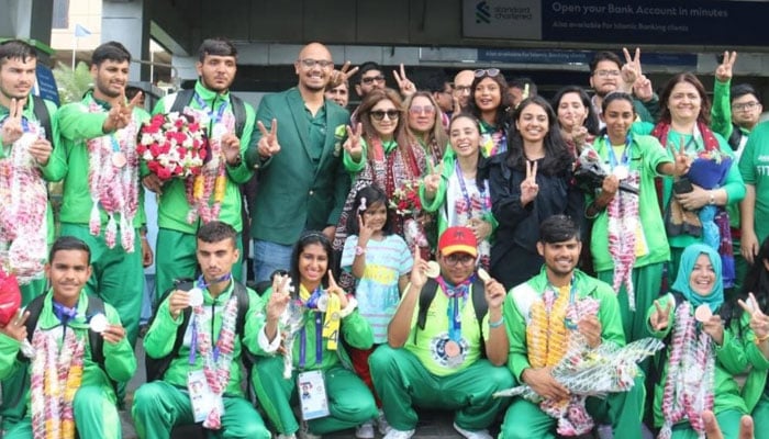 Special Olympics Pakistan Chairperson Ronak Lakhani with the Pakistani athletes that participated at the world games in Berlin, Germany. — PR