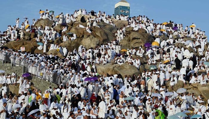 Muslim pilgrims crowd Saudi Arabia´s Mount Arafat,also known as Jabal al-Rahma or Mount of Mercy, during the climax of the Hajj pilgrimage on June 27, 2023. — AFP