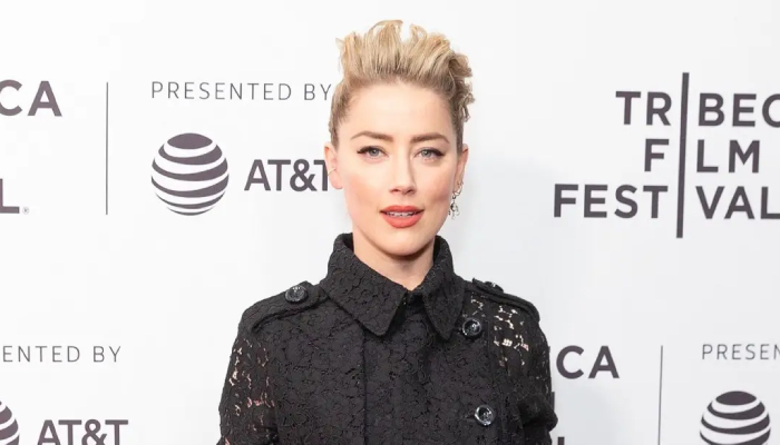 Amber Heard reflects on media scrutiny post defamation trial: ‘stones thrown at me’