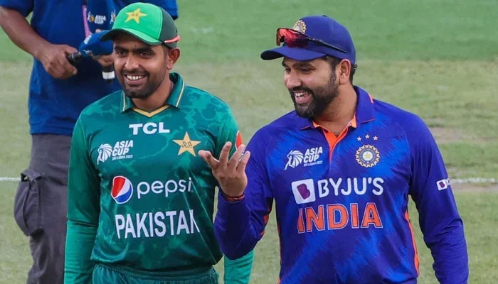 Pakistan skipper Babar Azam (Left) and Indian team captain Rohit Sharma are seen in good mood. PCB/Files