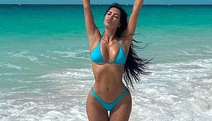 Kim Kardashian turns heads in blue bikini with new photoshoot