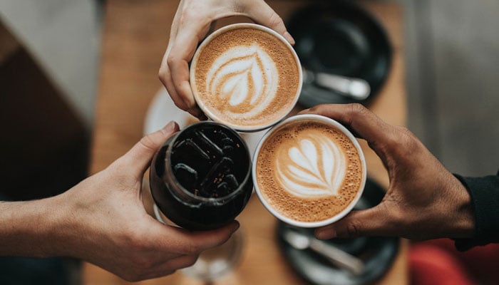 This representational picture shows three friends drinking coffee. — Unsplash/File