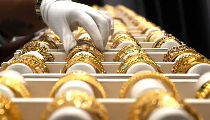 The picture shows gold bangles on display. — AFP/File