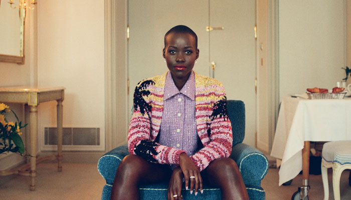 Lupita Nyongo shines in Chanel at Paris couture show. PHOTO: Vogue