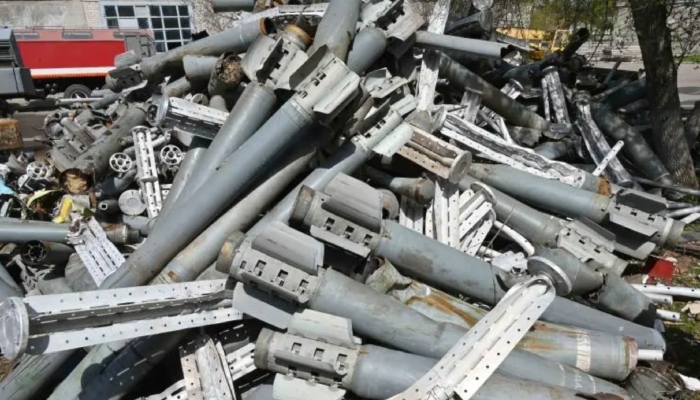 Remains of dozens of Smerch and Uragan cluster rockets collected by Ukraine’s State Emergency Service from Kharkiv in April 2022 — AFP/Files