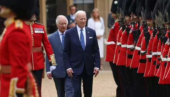 Joe Biden accused of breaching royal protocol on walkabout with King Charles