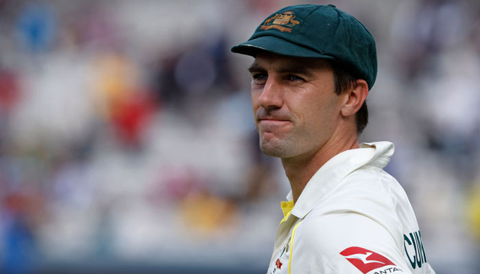 Australias Pat Cummins on the field after Australia win on day five of the second Ashes cricket Test match between England and Australia at Lords cricket ground in London on July 2, 2023. — AFP