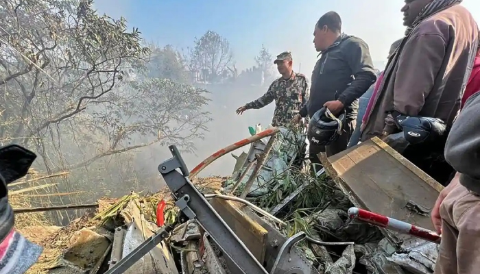 Rescuers at the crash site in Pokhara, Sunday — AFP/Files