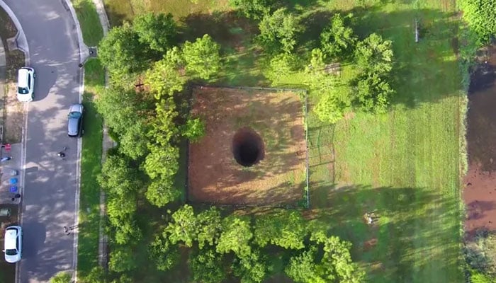 This picture shows the sinkhole in Hillsborough County, Florida that previously swallowed a man. — FOX13/Hillsborough County