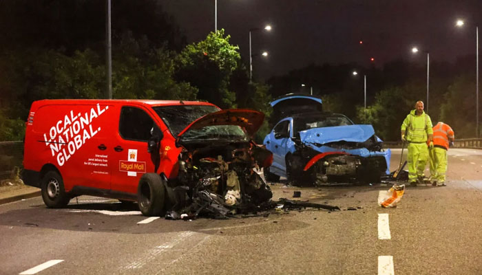 This picture shows the damaged vehicles involved in the crash in Beckton, east London. — The Sun/EPA/File