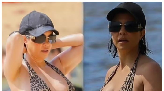 Kourtney Kardashian shows off baby bump in leopard bikini in Hawaii