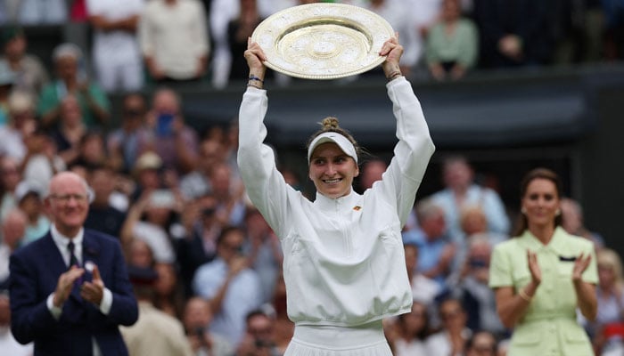 Czech Republic’s Marketa Vondrousova celebrates with the Venus Rosewater Dish trophy during the prize ceremony after winning the women’s singles final tennis match against Tunisia’s Ons Jabeur on the thirteenth day of the 2023 Wimbledon Championships at The All England Lawn Tennis Club in Wimbledon, southwest London, on July 15, 2023. — AFP