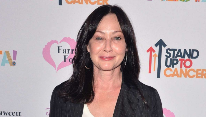 Shannen Doherty smiles and laughs after recent brain surgery