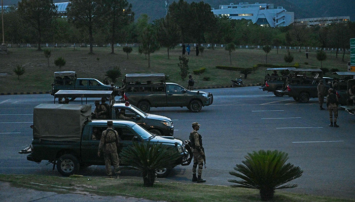 Army troops stand guard in the red zone in Islamabad on May 11, 2023. — AFP