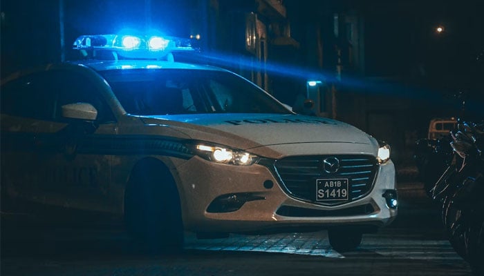 This representational picture shows a police car at night. — Unsplash/File