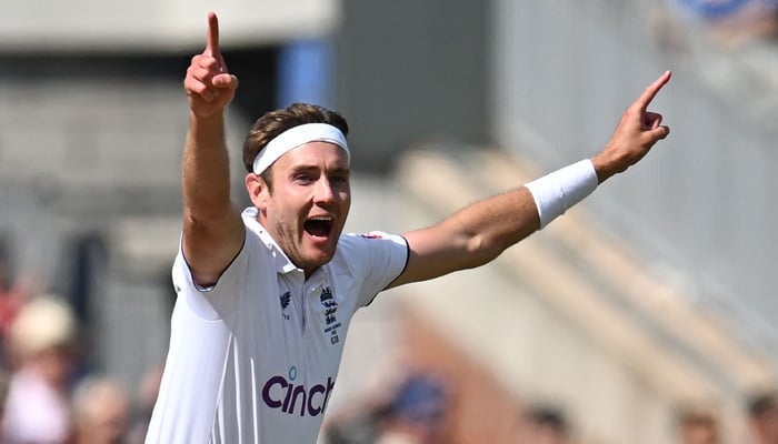 Englands Stuart Broad celebrates after taking his 600th wicket on the first day of the fourth Ashes cricket Test match between England and Australia at Old Trafford cricket ground in Manchester, north-west England on July 19, 2023. — AFP