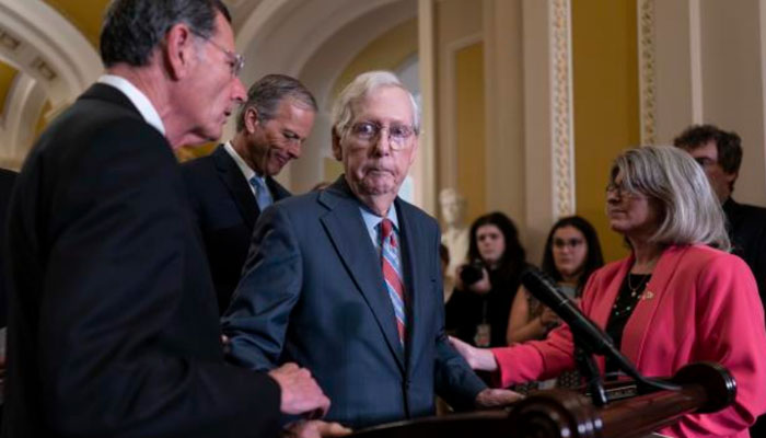 Senate GOP leader Mitch McConnell briefly leaves a crucial news conference after freezing up mid-sentence. news.yahoo.com