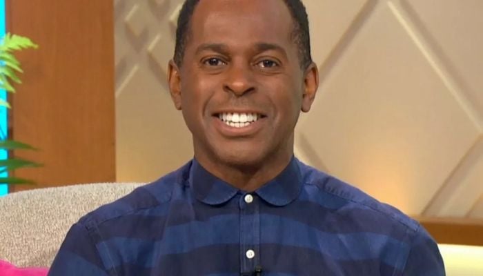 TV presenter Andi Peters cuts his birthday cake on ‘Good Morning Britain’