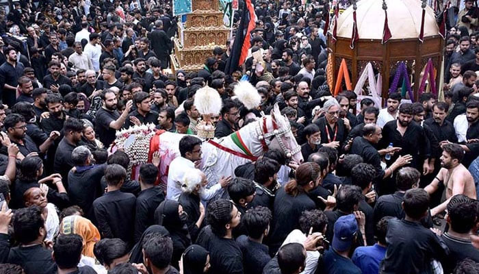 A large number of mourners attending the main procession of 9th Muharram in Lahore on July 28, 2023. — APP