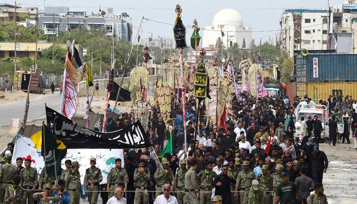 Muslims march during a procession on the eighth day of Ashura in the Islamic month of Muharram in Karachi on July 27, 2023, commemorating the seventh-century martyrdom of Prophet Mohammed´s grandson Hazrat Imam Hussain (RA). — AFP