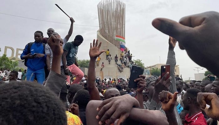 Supporters of the Nigerien defence and security forces gather during a demonstration outside the national assembly in Niamey on July 27, 2023.— AFP