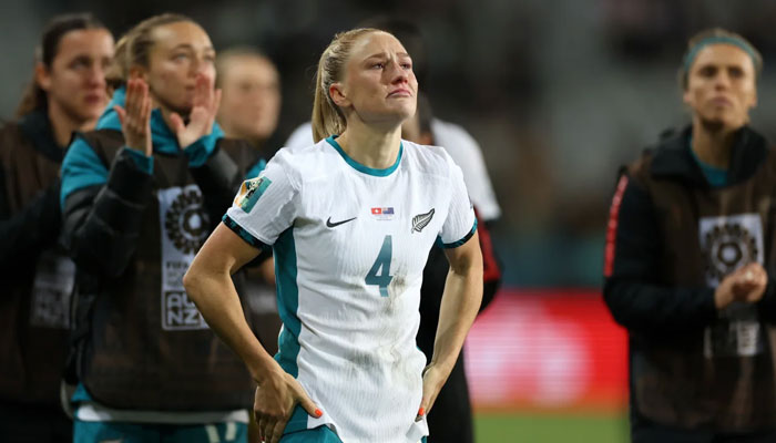 New Zealand players looked heartbroken after defeat on Sunday.—Getty