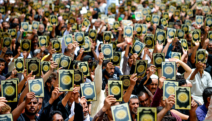 Muslims shout anti-Sweden slogans during a procession on the tenth day of Ashura in the Islamic month of Muharram, in Karachi on July 29, 2023. — AFP