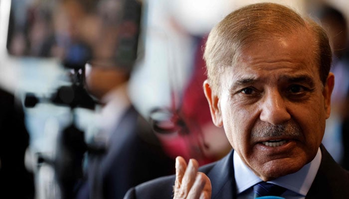 Prime Minister Shehbaz Sharif talking to the media. — AFP/Files