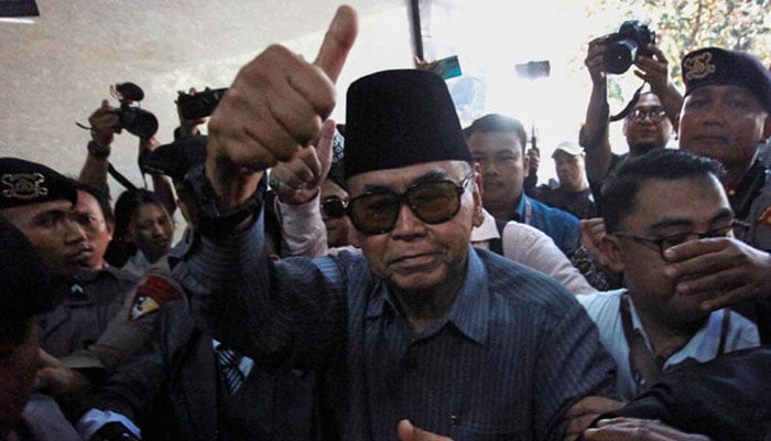 Leader of the Al Zaytun Islamic Boarding School, Panji Gumilang, walks before examination at the Indonesian Police Criminal Investigation Agency in Jakarta, Indonesia. — Arab News/File