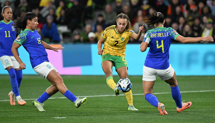 Jamaica´s midfielder #02 Solai Washington (2nd R) fights for the ball with Brazil´s defender #04 Rafaelle (R) during the Australia and New Zealand 2023 Women´s World Cup Group F football match between Jamaica and Brazil at Melbourne Rectangular Stadium, also known as AAMI Park, in Melbourne on August 2, 2023.—AFP