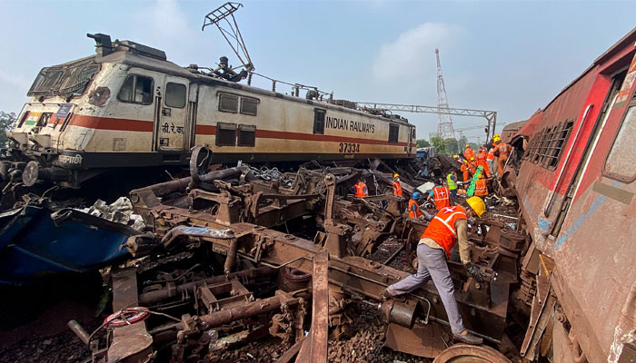 Rescue workers sift through wreckage at the accident site of a three-train collision near Balasore, about 200 km (125 miles) from the state capital Bhubaneswar, on June 3, 2023. — AFP/File