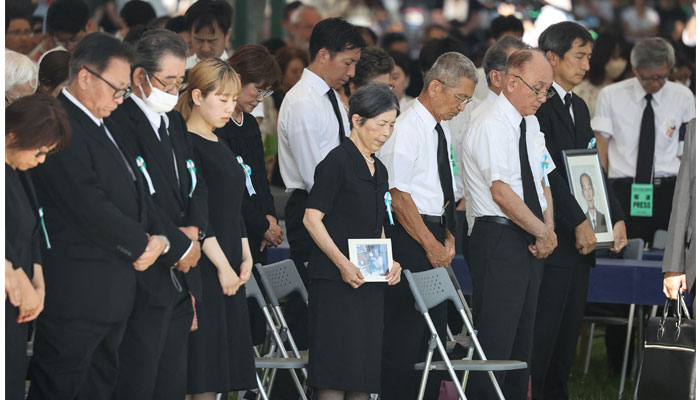 Attendees observe a moment of silence during a ceremony to mark the 78th anniversary of the world´s first atomic bomb attack, at the Peace Memorial Park in Hiroshima on August 6, 2023. — AFP